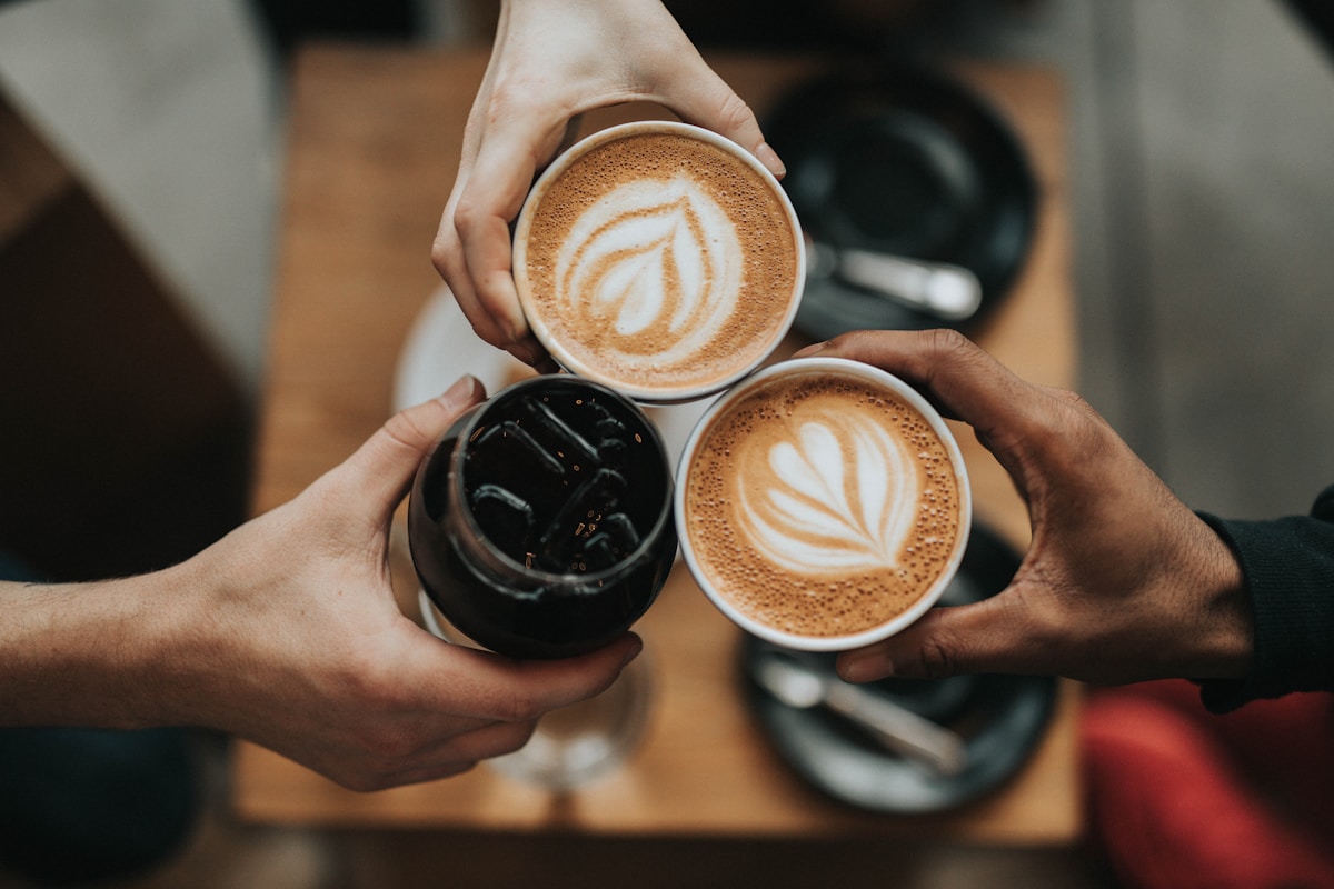 A cup of kopi on a saucer, close up